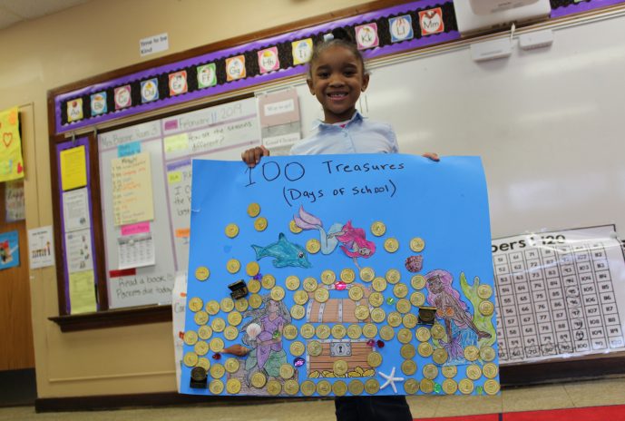 student with 100 treasures